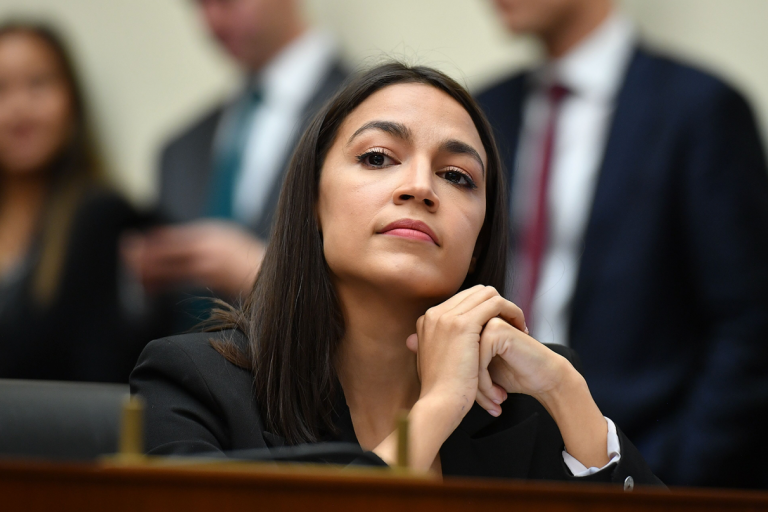 AOC Calls Out Tucker Carlson Ahead of Fox News Firing Him